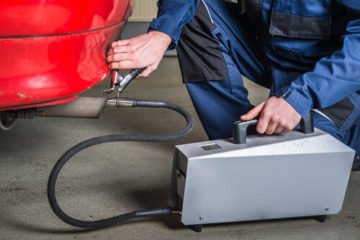 A mechanic checks on a defective automotive part in Roanoke, Virginia.