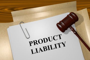 Paperwork on the desk of a product liability lawyer in Roanoke Virginia.