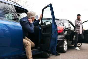 Drivers getting out of their cars due to accident..